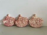 a** Set of 3 Vintage 3” “Seasons Greeting” Pink Ceramic Ornaments