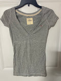 +* Women’s Junior’s XSmall Hollister V-neck Gray Short Sleeves
