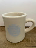 a** MWare Coffee Tea Cup Mug White with Blue “Bread” Logo Stoneware