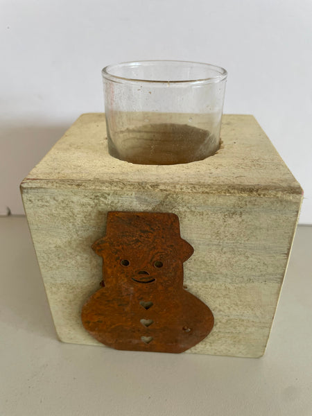 a** Rustic Wood Block with Glass Votive Candle Holder with Rusty Metal Snowman Figurine