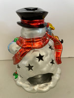 a** Vintage House of Lloyd Christmas Around the World “Shimmering Snowman” Votive Candle Holder