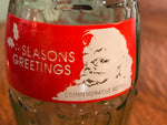 a* Vintage COCA COLA Coke Commemorative 8 Oz Bottle Seasons Greetings Santa Holiday Empty Retired