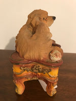 a** Vintage Dog Figurine Sitting on Table