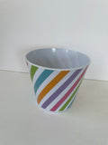 a** Springtime Easter Rainbow Plastic Planter Vase