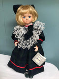 a* Vintage Anco 1995 17” Porcelain Brianna Doll on Stand