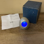 a* Brookstone BOB Silver 5-in-1 Wobble Clock Oval Egg Desk Alarm Temperature Timer