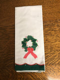 a** Christmas Holiday Green Wreath Appliqué on White Tea Towel