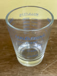 a** Shot Glass Marked Measurements Ounces  Milliliters Teaspoons Tablespoons