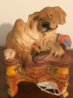 a** Vintage Dog Figurine Sitting on Table