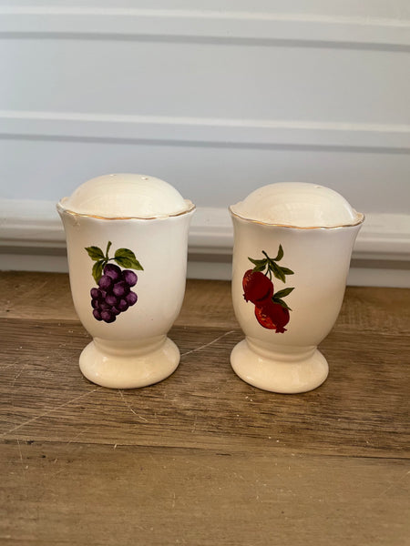 a** Porcelain Salt and Pepper Shakers Ivory with Gold Rim Fruits 4.25” H x 3” Diameter