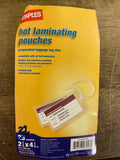 a** Staples Set/22 Laminating Pouches Prepunched Luggage Tags with Hanging Loop 2.5”x 4.25”