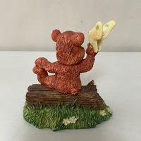 a** Vintage Bear Sitting on Log with Butterfly Decor Resin Figure