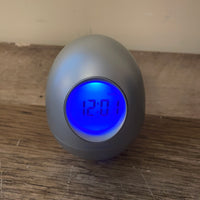 Brookstone BOB Silver 5-in-1 Wobble Clock Oval Egg Desk Alarm Temperature Timer