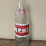 a* Vintage NEHI Soda Empty 10 oz. Bottle Red and White