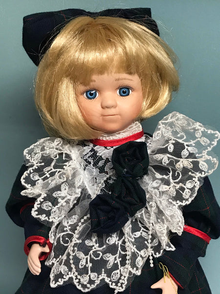 a* Vintage Anco 1995 17” Porcelain Brianna Doll on Stand